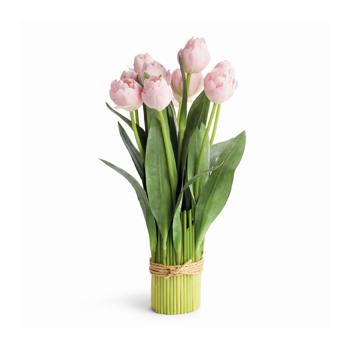 Bouquet of pink tulips tied with twine on a white background