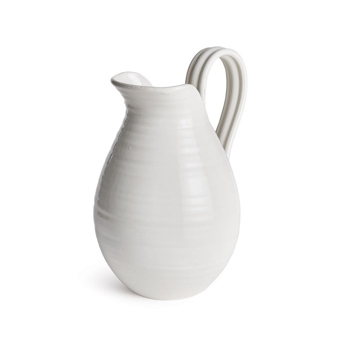 White ceramic pitcher on a white background