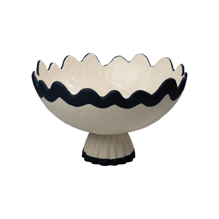 Decorative bowl with wavy rim and pedestal base on a white background