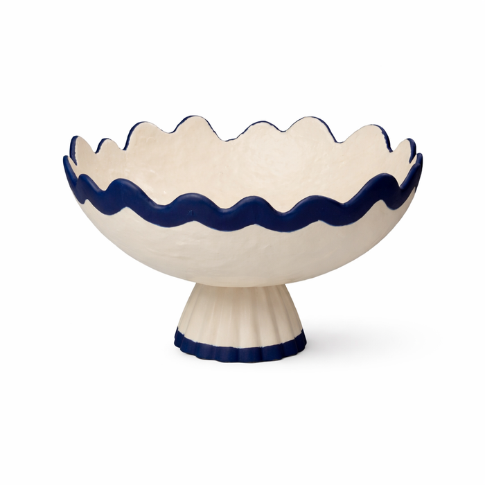 Decorative bowl with wavy rim and pedestal base on a white background