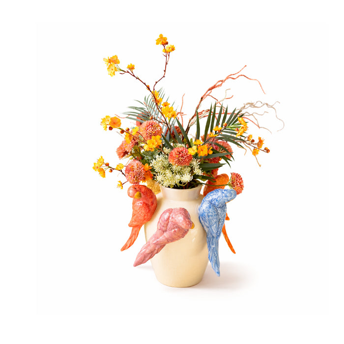 Decorative vase with colorful birds, flowers and leaves on a white background