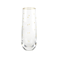 Clear glass with gold polka dot pattern on a white background