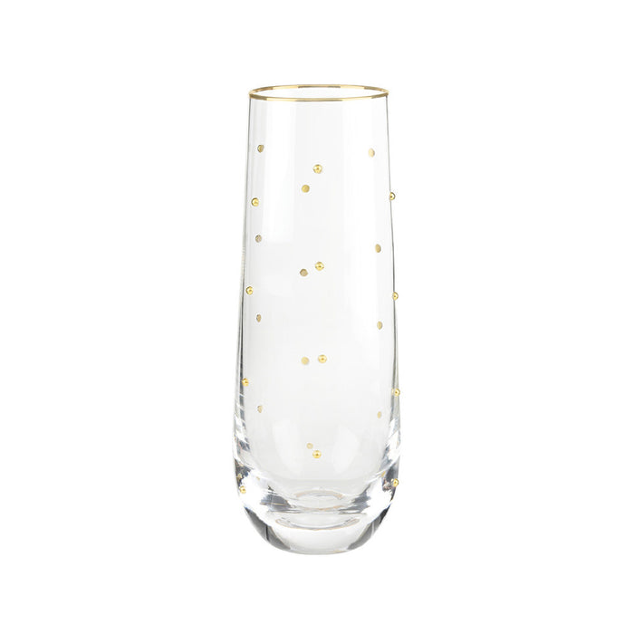 Clear glass with gold polka dot pattern on a white background