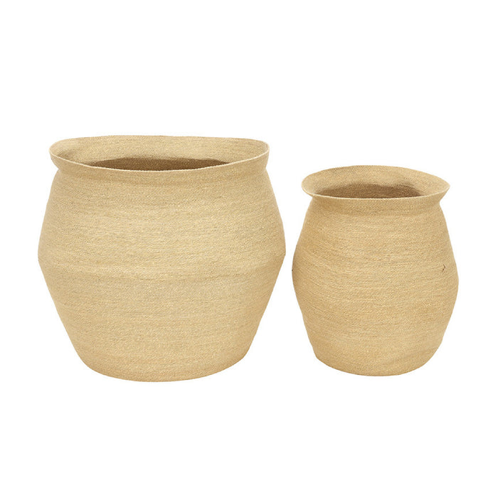 Two beige woven baskets on a white background