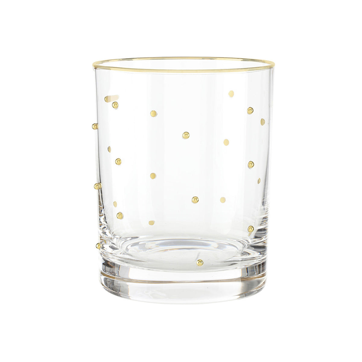 Clear glass tumbler with gold polka dots on a white background