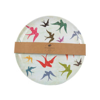 Round ceramic plate with colorful bird design and a brown band, on a white background