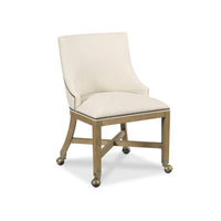 Morgan Game Chair with Handle by Woodbridge Furniture—cream upholstery, wood legs, brass casters; ideal for your office.
