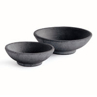 Two dark gray textured teracotta bowls of different sizes, displayed on a clean white background.