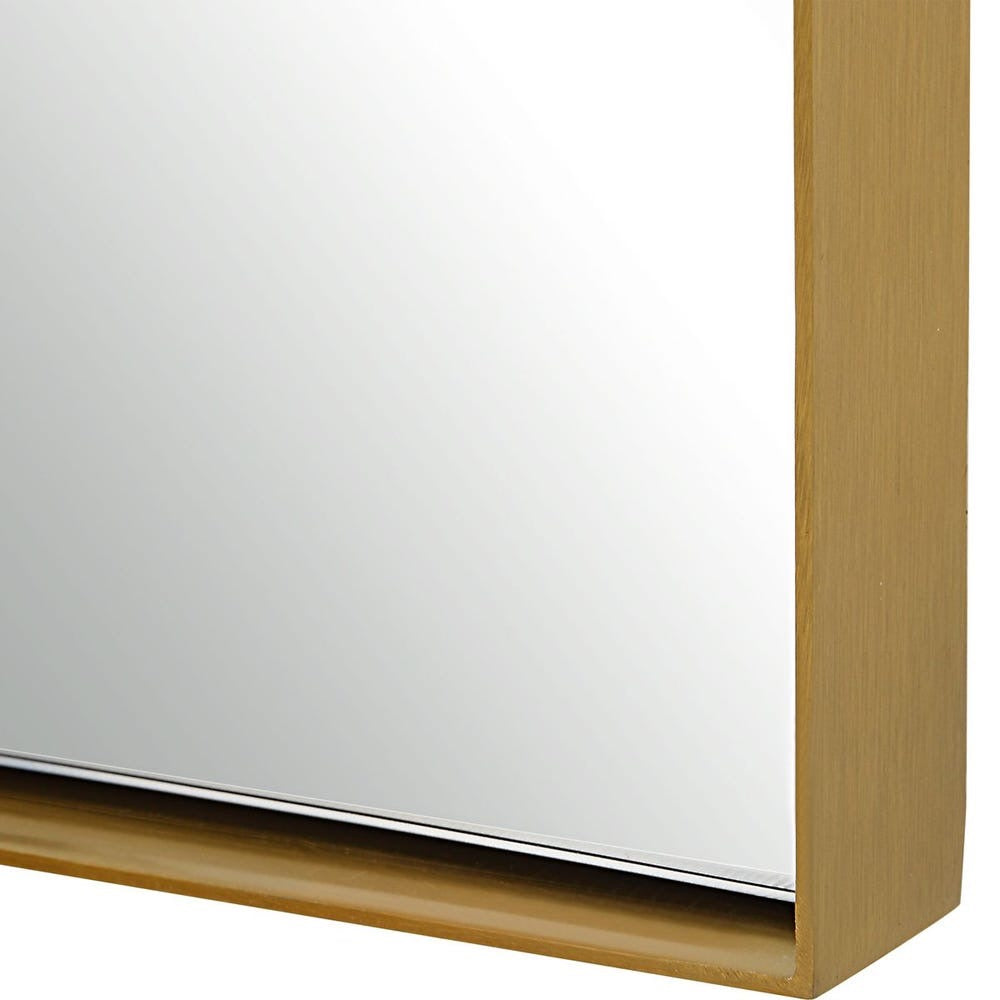 Close-up of a mirror corner antique brass