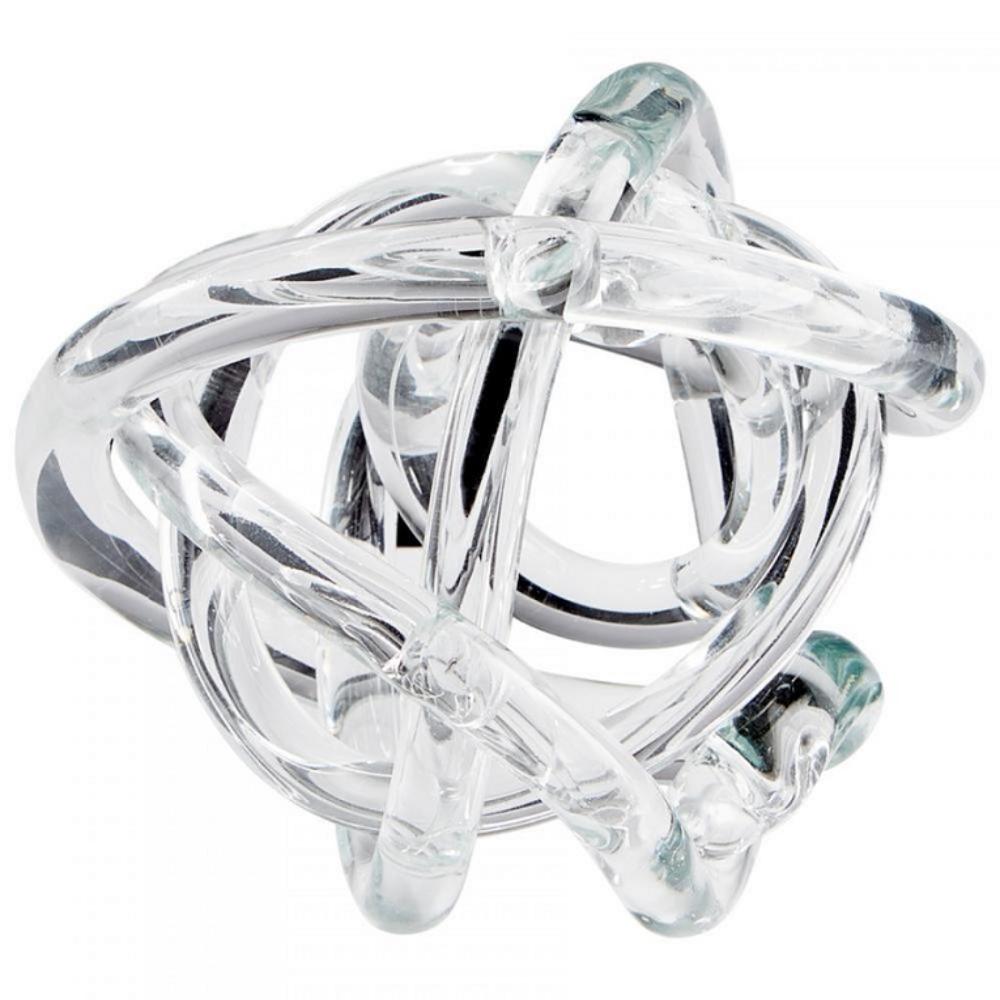The Cyan Design Clear Glass Knotty Sphere features smooth, interwoven loops and a glossy finish for a striking accent.