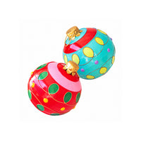 Two colorful Christmas ornament balls on a plain white background. One ball is red with pink bands and green and yellow polka dots, and the other is turquoise with yellow and purple polka dots and gold trim.