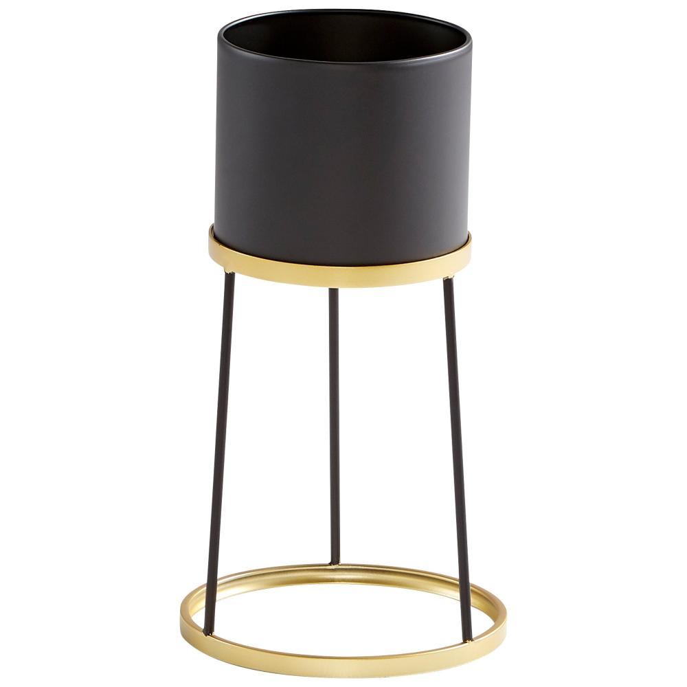 The Liza Gold + Black Planter by Cyan Design features a contemporary cylindrical pot with a sleek minimalist metal frame.