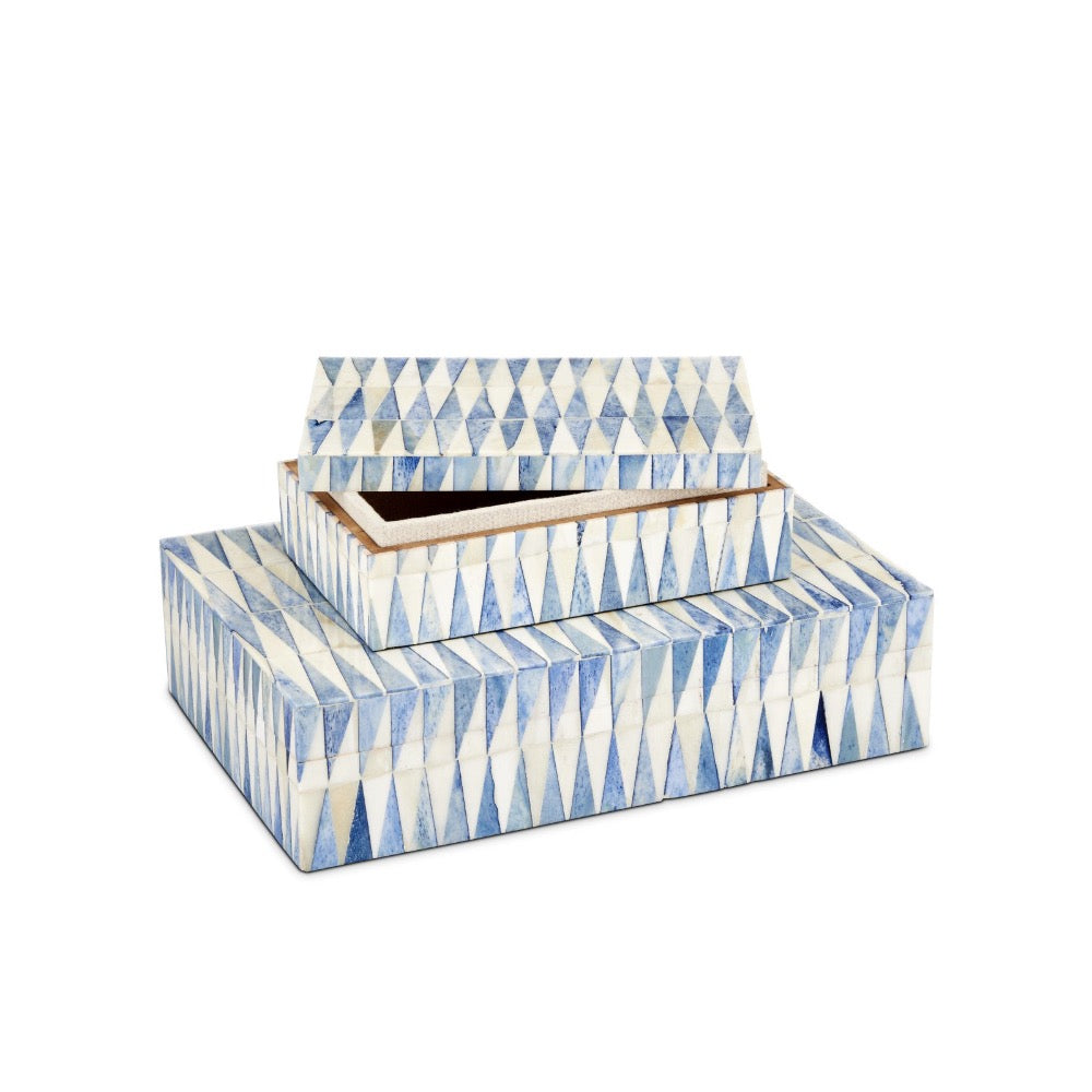 Set of three decorative boxes with blue and white geometric pattern on a white background