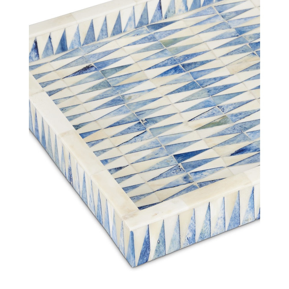 Decorative tray with blue and white geometric pattern on a white background
