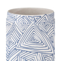 Ceramic vase with blue geometric pattern on a white background