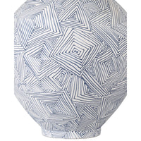 Geometric patterned vase on a white background