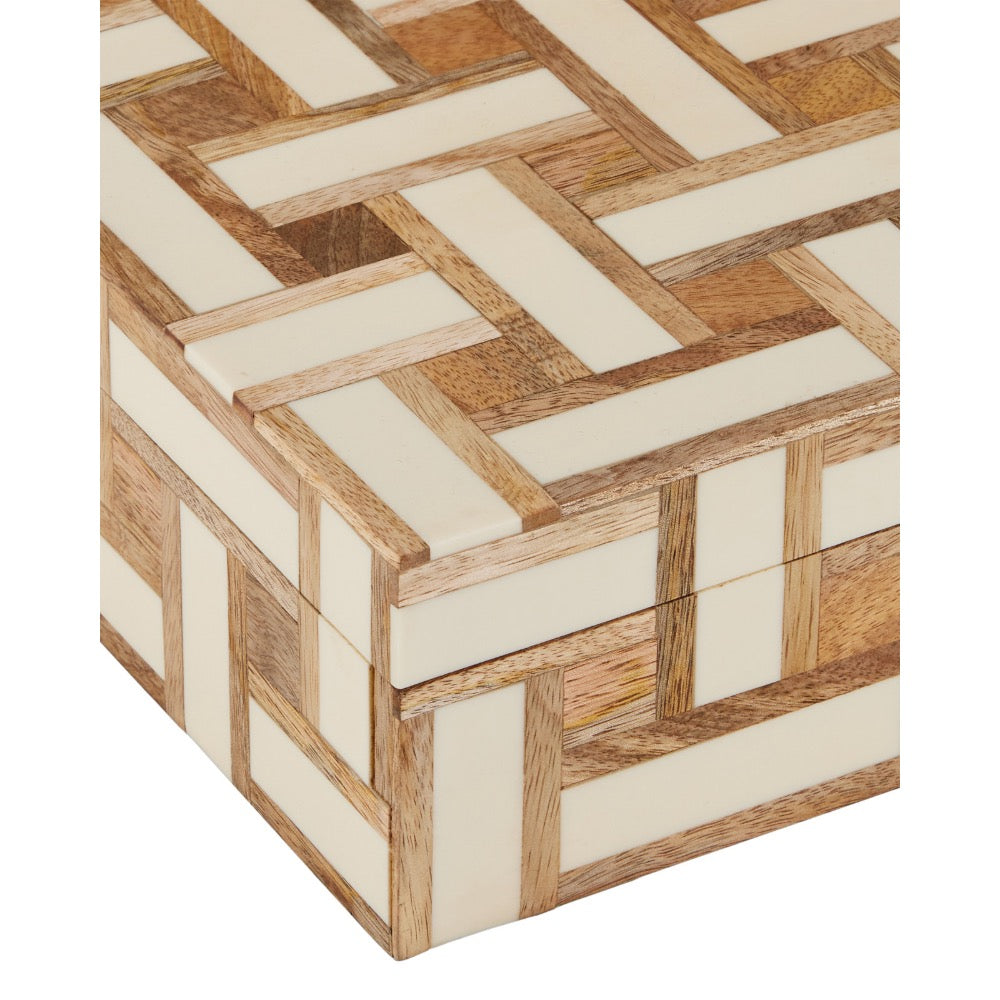 Wooden box with geometric pattern on a white background