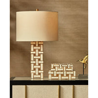 Decorative lamp with geometric pattern on a wooden surface