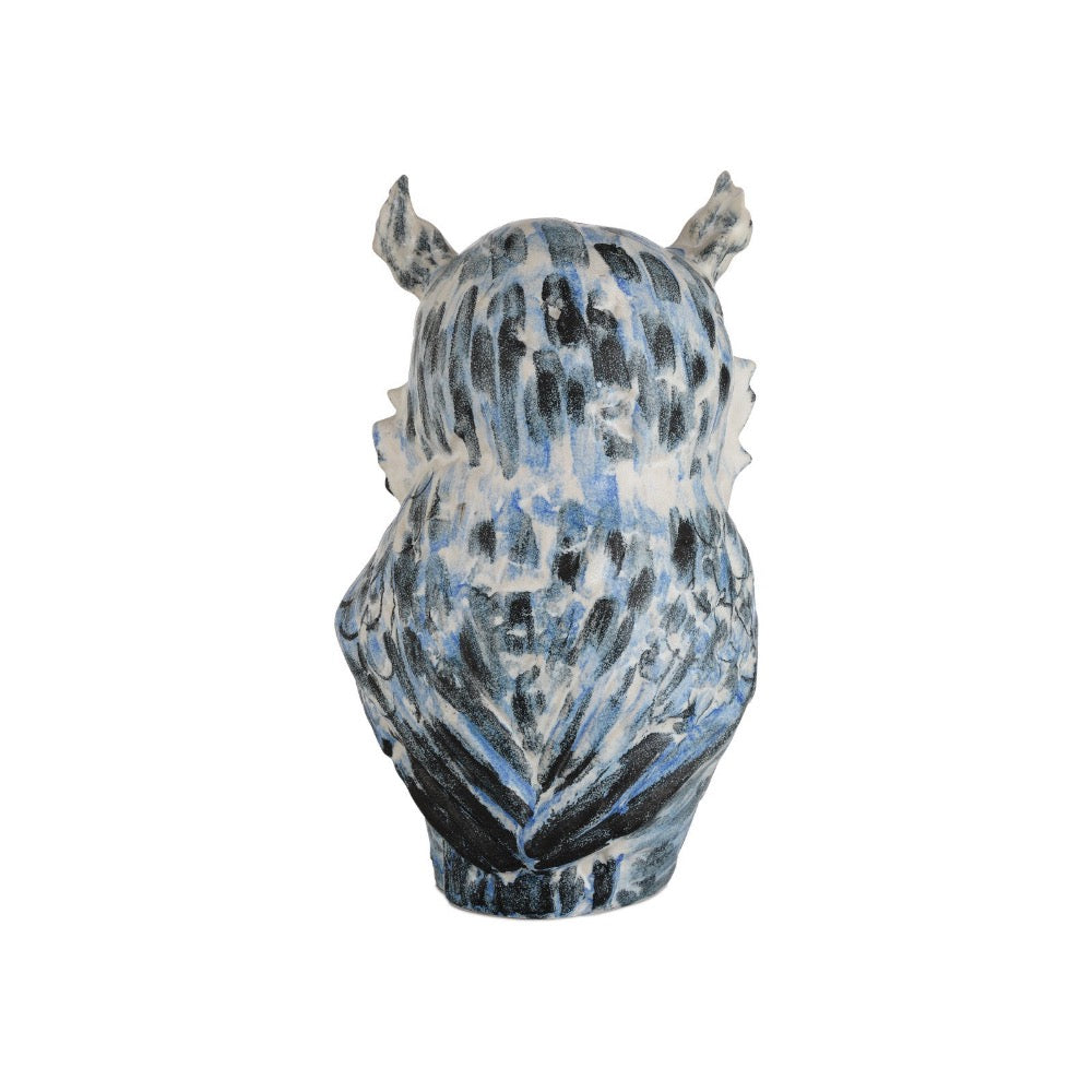 Decorative owl head sculpture with blue and gray pattern on a white background