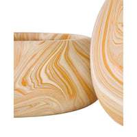 A close-up studio shot of a round wooden bowl with a matching lid, showing swirling natural wood grain in warm beige, cream, and orange tones against a white background.