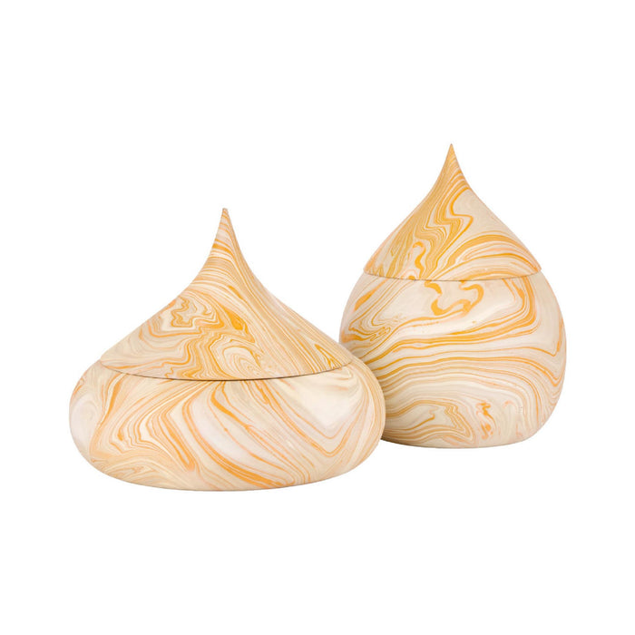 Two teardrop-shaped lidded containers with a cream and yellow marbled pattern, shown on a plain white background.