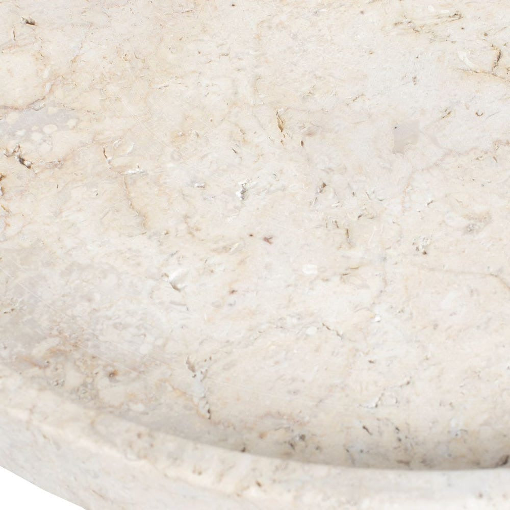 Close-up of beige stone surface with subtle variations