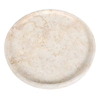Round beige stone tray on a white background