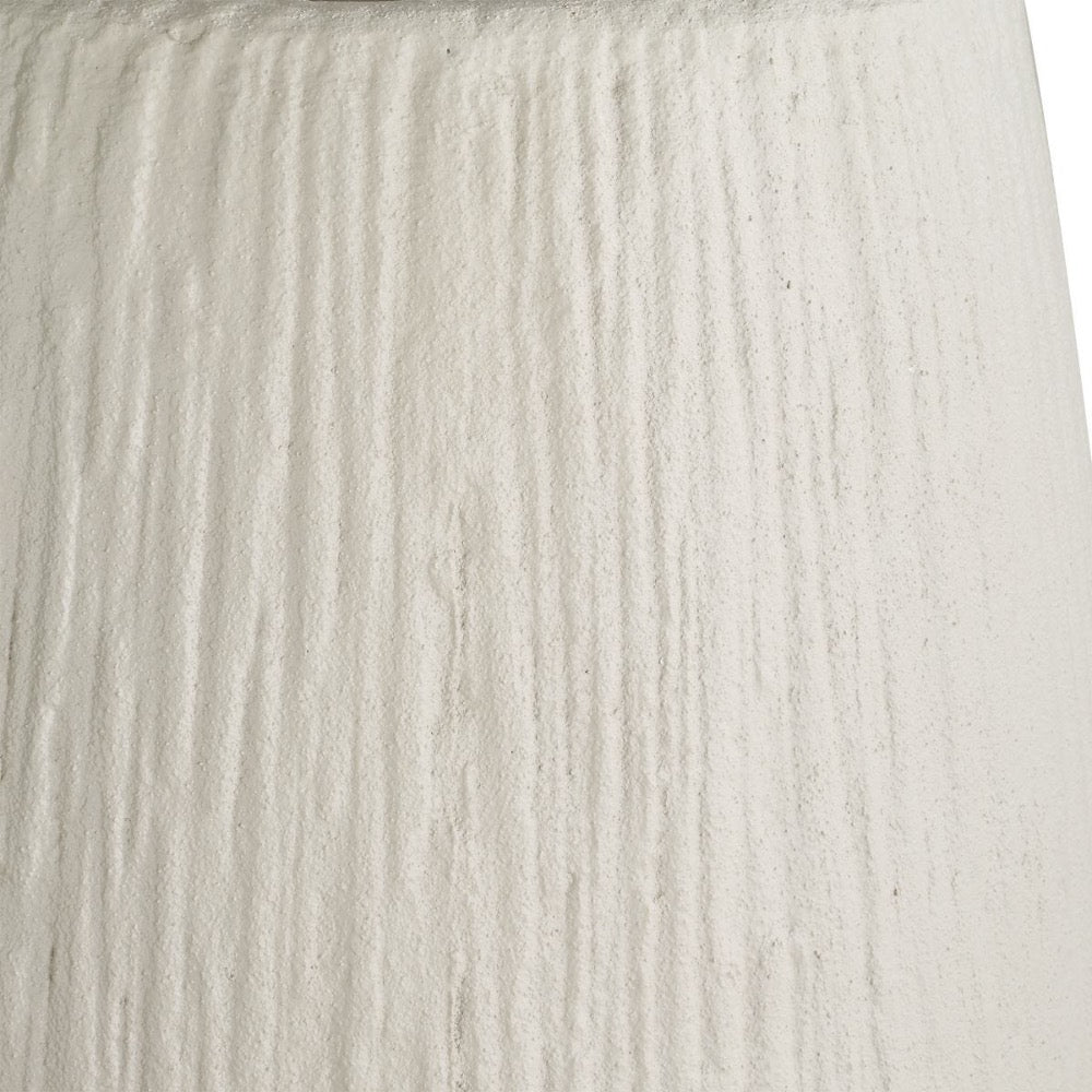 Close-up of textured white planter  with horizontal lines