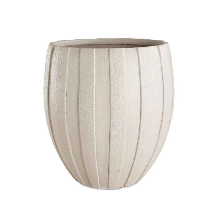 Beige ceramic planter with ribbed texture on a white background