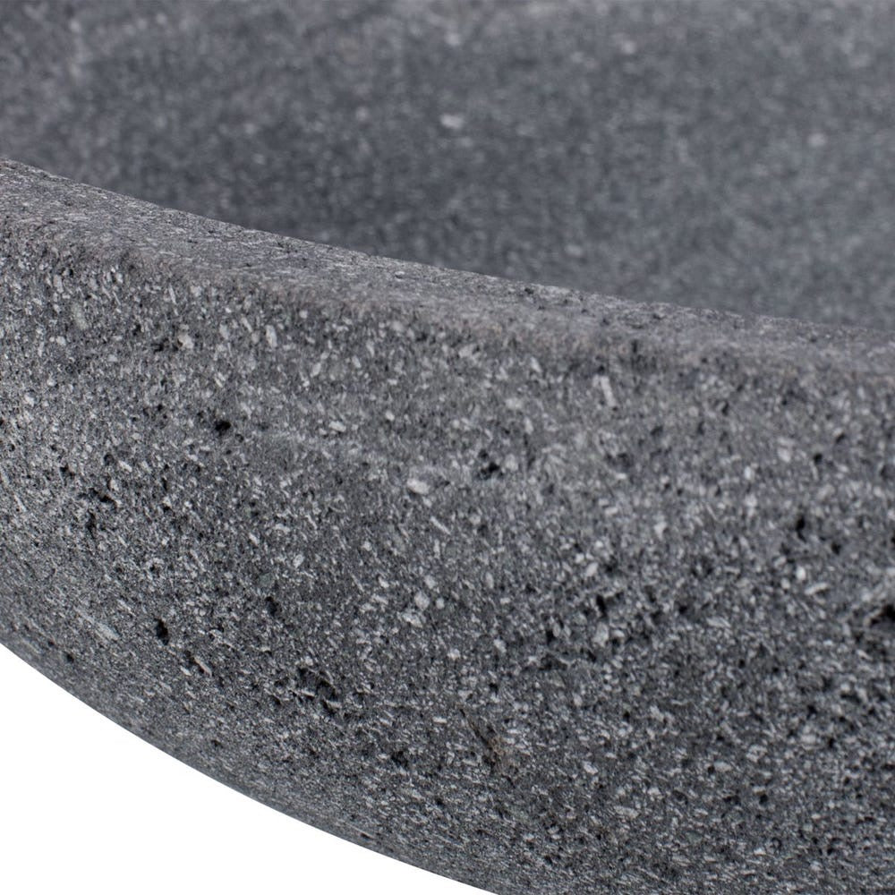 Close-up of a textured gray stone bowl