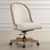 The Lithe Desk Chair by Uttermost features white upholstery, rolling casters, and a wood frame on a light wood floor.