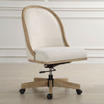 The Lithe Desk Chair by Uttermost features white upholstery, rolling casters, and a wood frame on a light wood floor.
