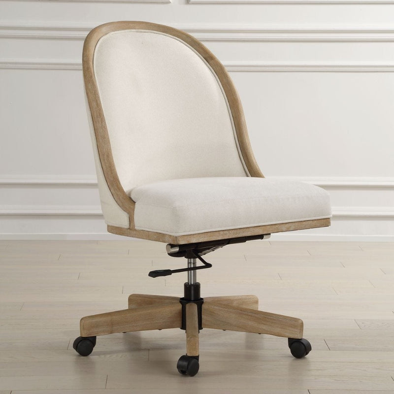 The Lithe Desk Chair by Uttermost features white upholstery, rolling casters, and a wood frame on a light wood floor.
