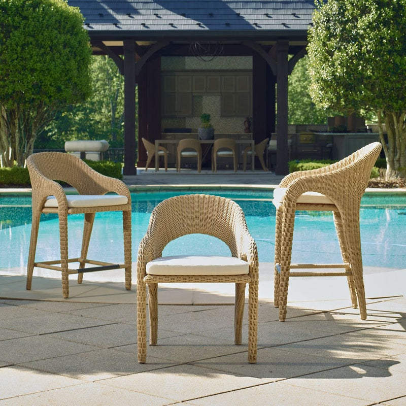 outdoor dining arm chair natural wicker frame white upholstered seat 