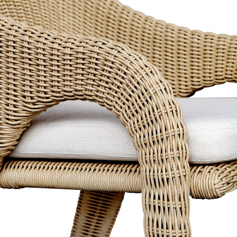 outdoor dining arm chair natural wicker frame white upholstered seat 