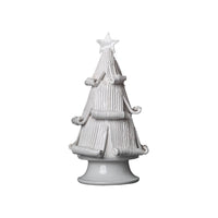 white christmas tree statue with curled branches 
