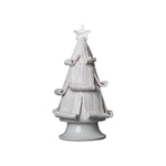 white christmas tree statue with curled branches 