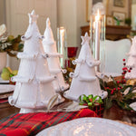 white christmas tree statue with curled branches 
