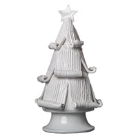 white christmas tree statue with curled branches 