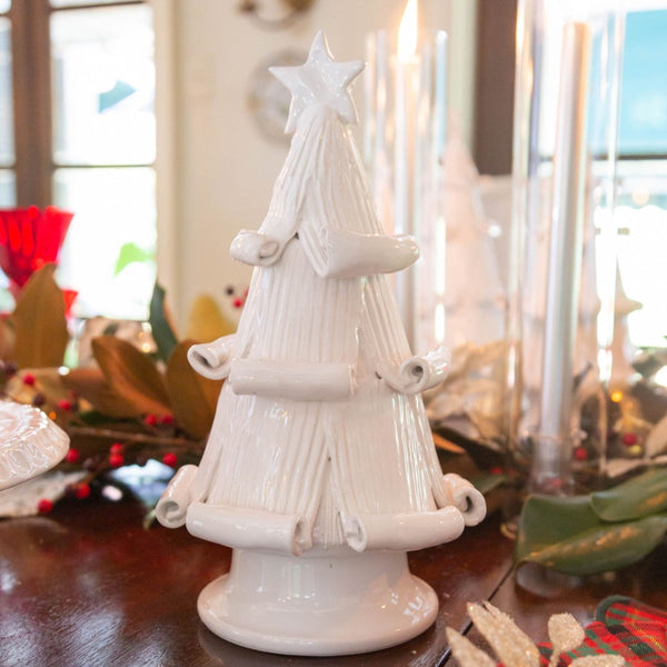 white christmas tree statue with curled branches 