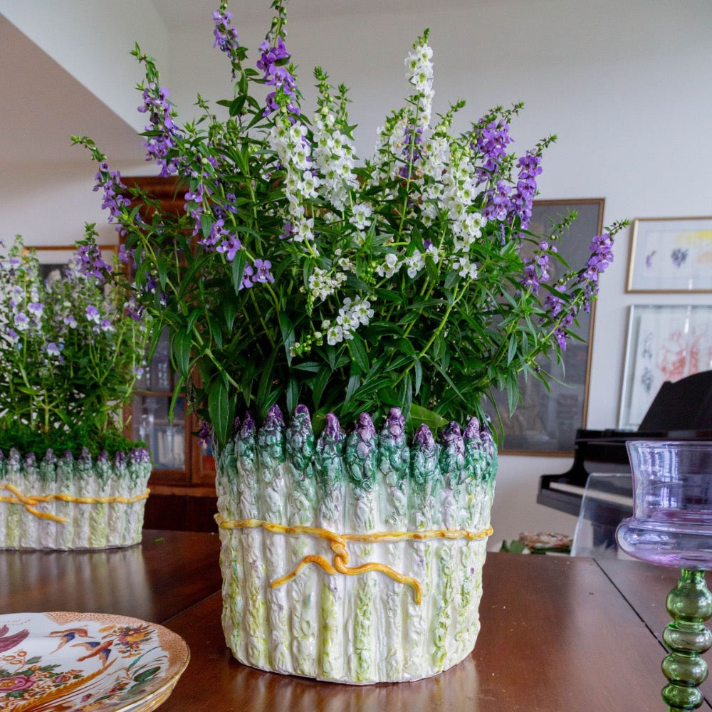 Decorative vase with flowers on a wooden table
