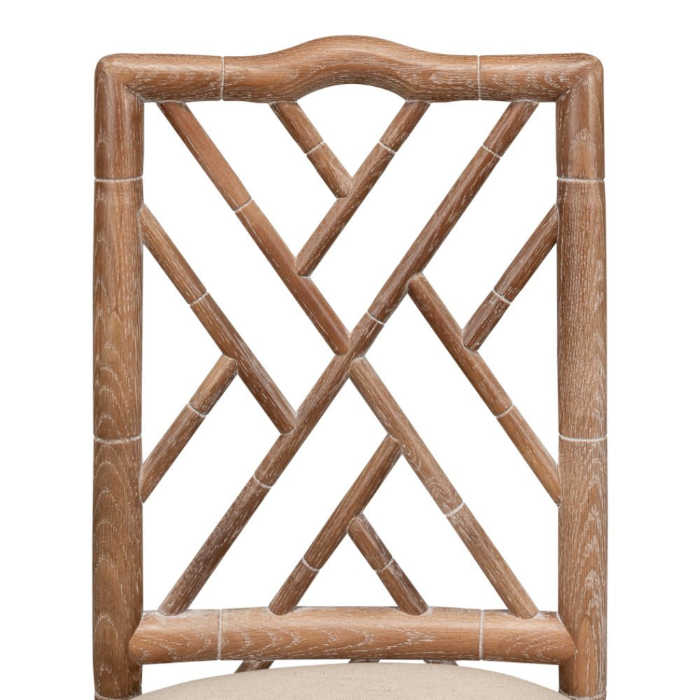 Brighton Bamboo Whitewashed Oak Side Chairs (set of 2) by Sarreid, Ltd. feature geometric, hand-carved backs.