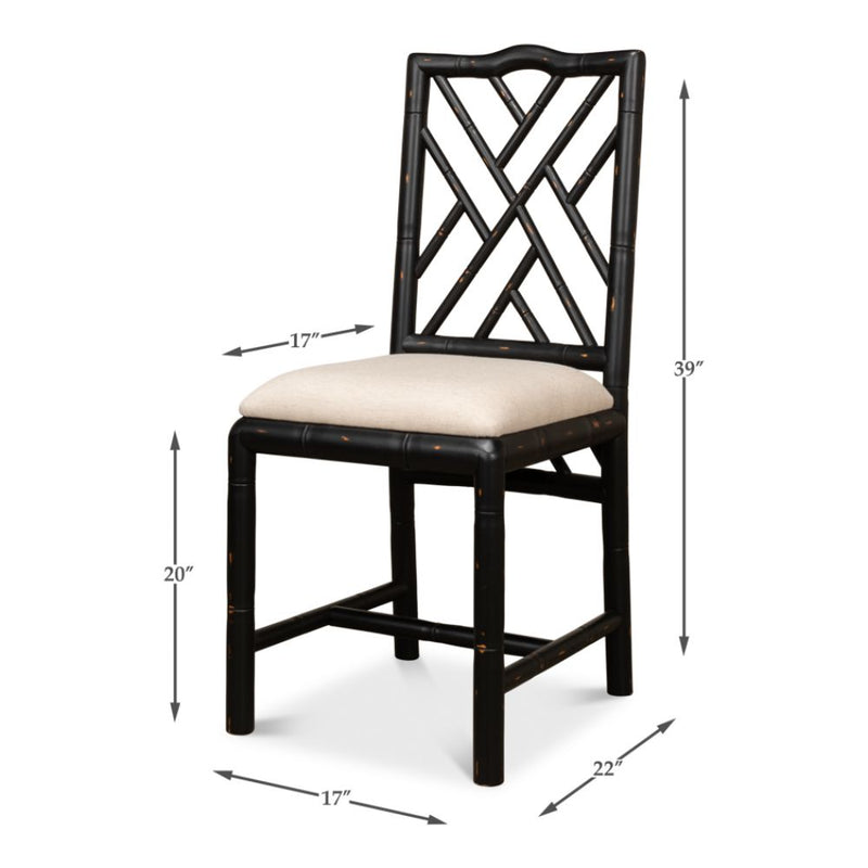 Brighton Bamboo Black Side Chairs by Sarreid feature a beige cushion, crisscross backrest, and wooden frame.