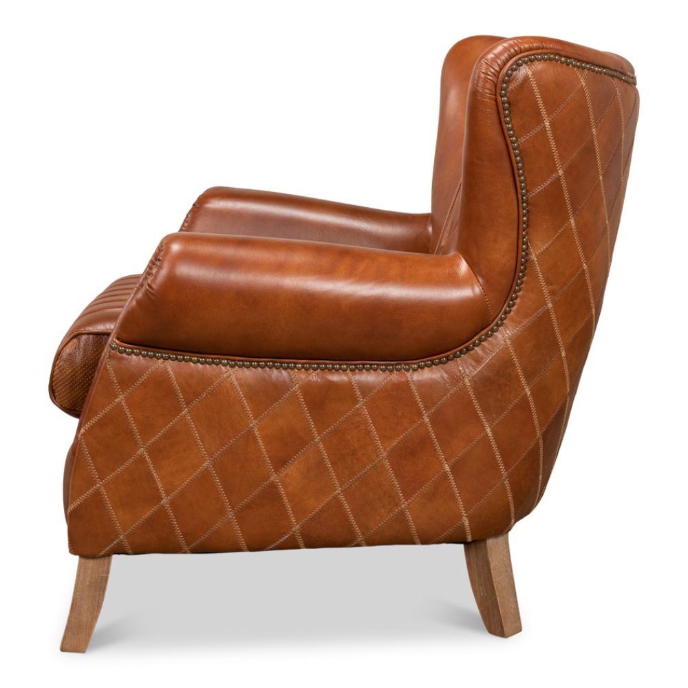 brown cognac tufted leather diamond stitching wing chair