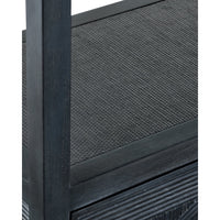 Close-up detail of a dark charcoal textured furniture piece with a black wood frame, showing woven or ribbed paneling and a vertical post.