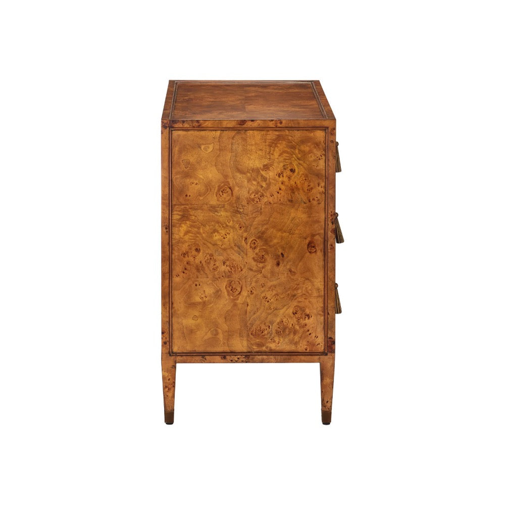 A vintage-style wooden chest or cabinet with a rich burl wood grain finish, featuring three drawers with decorative pulls and tapered legs, shown against a plain white background.