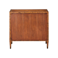 A vintage wooden chest or cabinet with a warm reddish-brown finish, featuring visible metal rivets along the edges and legs, shown against a plain white background.