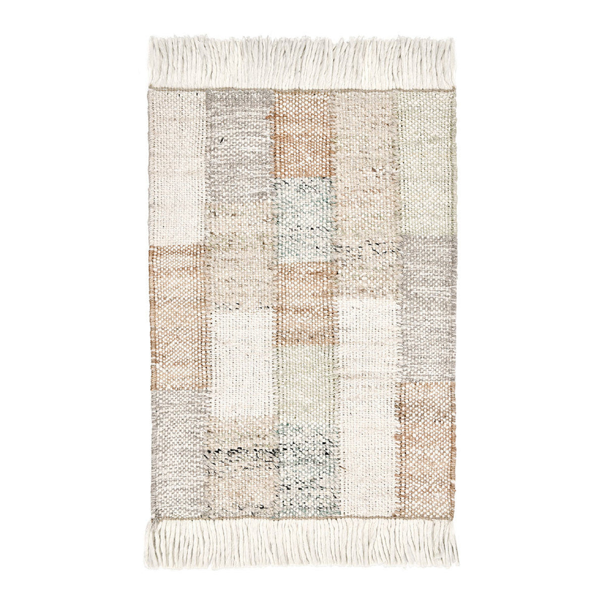 A rectangular woven area rug with fringe on the top and bottom edges, featuring a patchwork design in neutral tones of beige, cream, light brown, and gray.