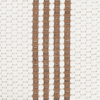 Textured fabric with brown and white stripes on a neutral background