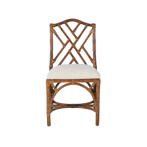 Kenian's Chippendale Side Dining Chair in a tortoise finish boasts a lattice backrest and a white cushioned seat for an elegant touch.